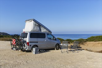 Campervan on car park by the sea