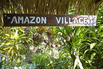 Amazon Village sign in the Amazon rainforest