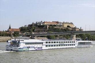 River cruise ship in front of Petrovaradin Fortress