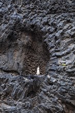 Madonna figure in volcanic rock