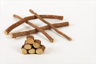 Group of sliced natural licorice roots isolated on a white background