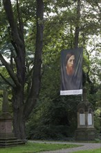 Banner with portrait of landscape painter August Weber