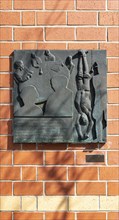 Bronze plaque on the house of the former Verein christlicher Junger Männer