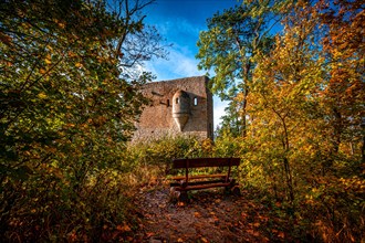 View of Lobdeburg Castle in autumn with blue sky and veil clouds