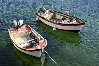 Two boats with outboard motors