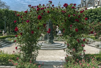 Rose arch in a park near Square René Viviani