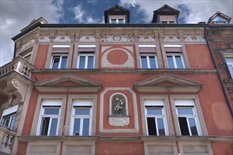 Art Nouveau façade with the symbolic figure of the Mohrenapotheke built around 1900