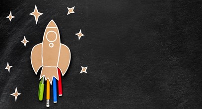 Back school rocket with copy space pencils