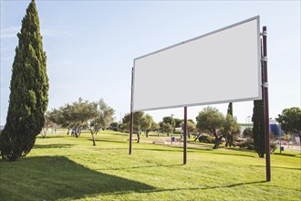 Blank billboard advertisement green grass garden