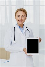 Doctor holding tablet mock up
