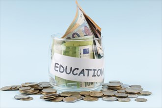 Education savings jar arrangement