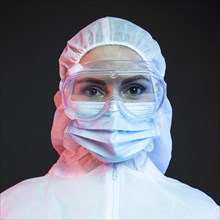 Female doctor wearing protective medical wear