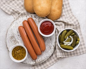 Flat lay sausage with buns sauce