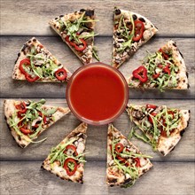 Flat lay tasty pizza wooden background