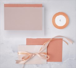 Flat lay wedding composition with minimalist invitations mock up