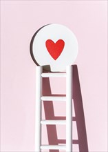 Front view paper heart with ladder