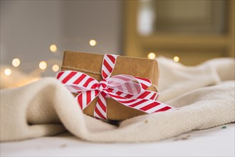 Gift box with striped ribbon