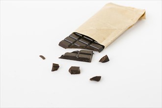High angle chocolate bar paper bag