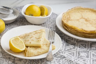 High angle pancakes with lemons