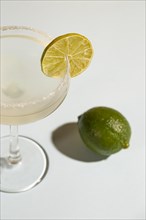 Homemade classic margarita drink with lime salt white background