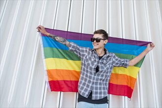 Homosexual keeping lgbt flag