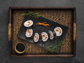 Maki sushi rolls black slate