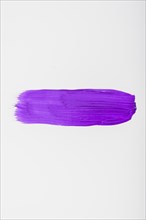 Purple watercolor brush strokes with space your own text
