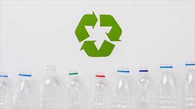 Recycle symbol plastic bottles grey backgound