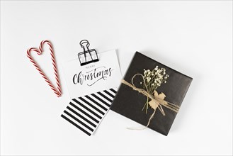 Small gift box with christmas inscription paper