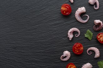Top view octopus pieces with vegetables