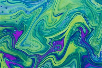Wavy green violet fluid acrylic pour painting