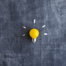 Yellow light bulb chalkboard