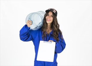 Young deliverywomman with water carafe