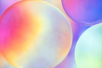 Abstract colorful oil bubbles blurred background