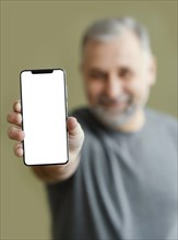 Bearded man with mobile