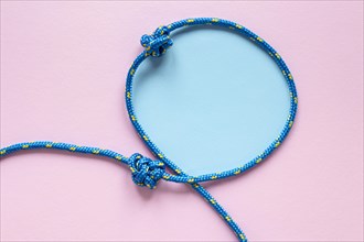 Copy space blue rope knot loop
