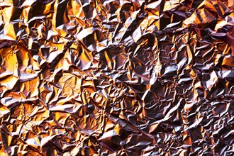 Crumpled copper aluminium foil background