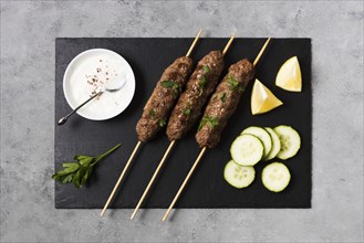 Delicious arabic fast food skewers slices cucumber