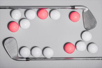 Flat lay golf balls frame with golf club