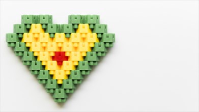 Flat lay heart shape made lego blocks
