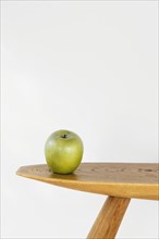 Minimal abstract concept apple table front view