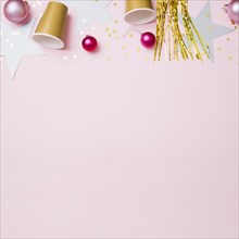 New year composition paper cups with baubles