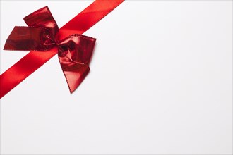Red ribbon with bright bow