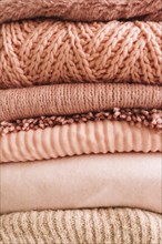 Stack knitted sweaters