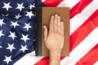 Top view hand book american flag