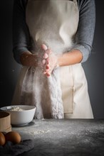Vertical shot woman with flour palms