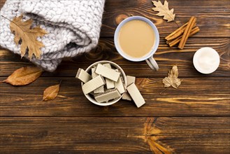 Autumn coffee wafers layout wooden background