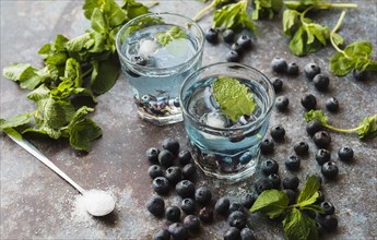 Berries mint around refreshing blueberry drinks