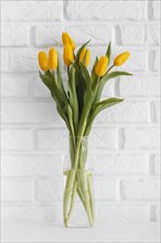 Bouquet tulips transparent vase