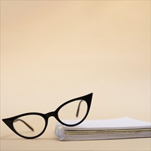 Close up retro eyeglasses book
